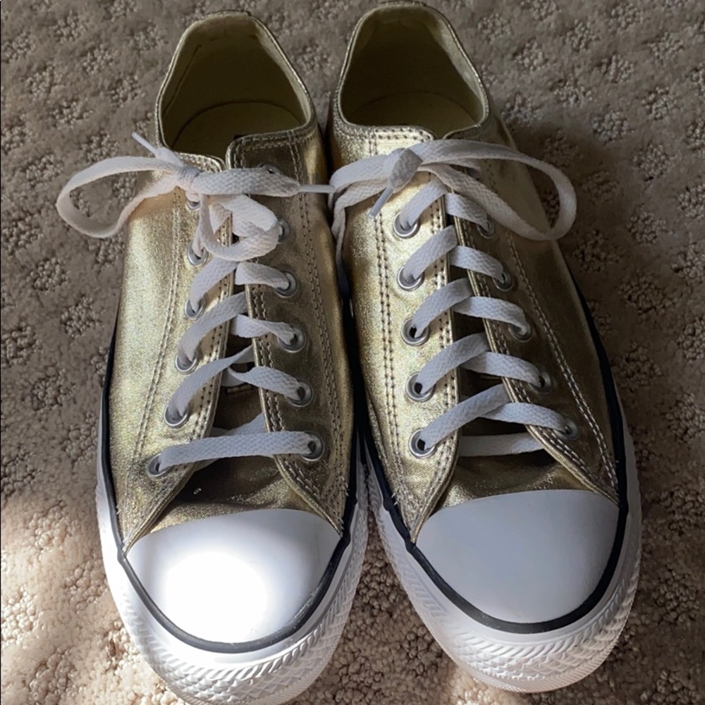 gold low top converse